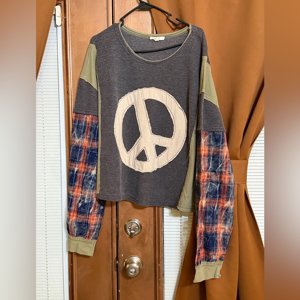 Long sleeve top size medium, but loose fit